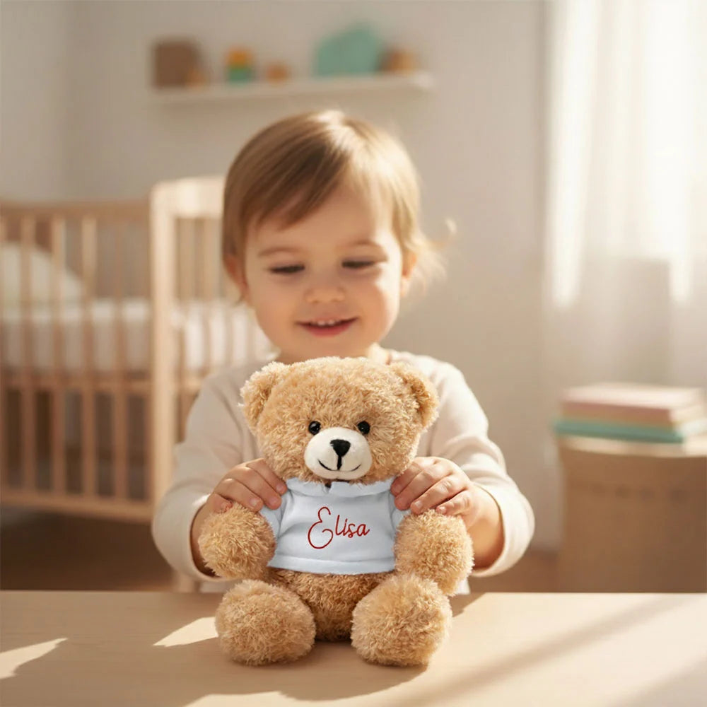Orsacchiotto personalizzato con felpa bianca e nome rosso