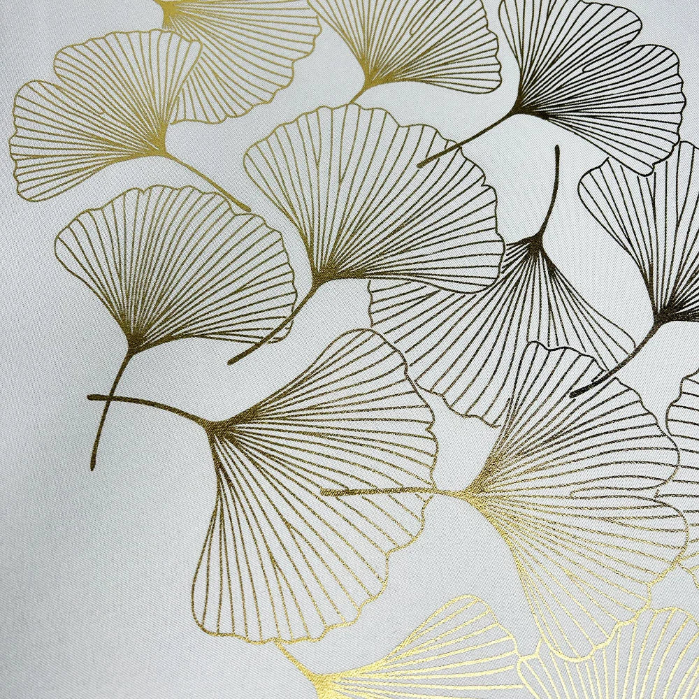 Tovaglia bianca con foglie di ginkgo dorate, effetto lino