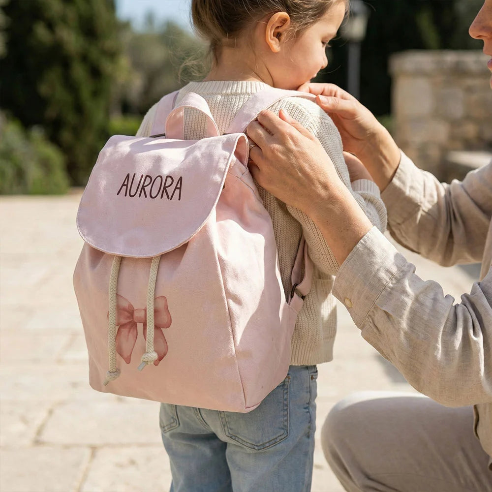 Zainetto bambino con patta e bottone a pressione