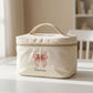 Trousse in cotone con chiusura zip e maniglia per trasporto