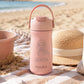 Borraccia personalizzata rosa Nouka con nome Giorgia e sirenetta sulla spiaggia