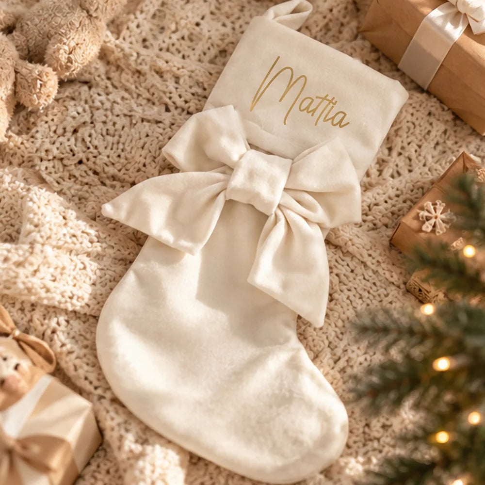 Calza di Natale avorio personalizzata con nome in oro e grande fiocco tono su tono