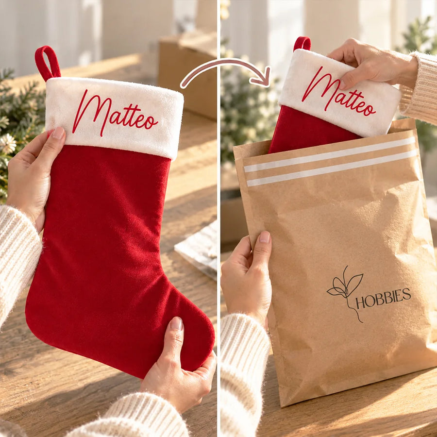 Calza di Natale rossa in velluto con nome personalizzato, controllata e inserita nella confezione kraft Hobbies.