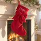 Calza di Natale rossa personalizzata con nome appesa al camino