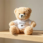 Orsacchiotto peluche seduto con felpa bianca personalizzata con nome