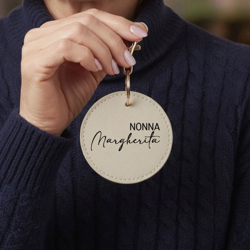 Portachiavi in pelle saffiano beige con gancio dorato