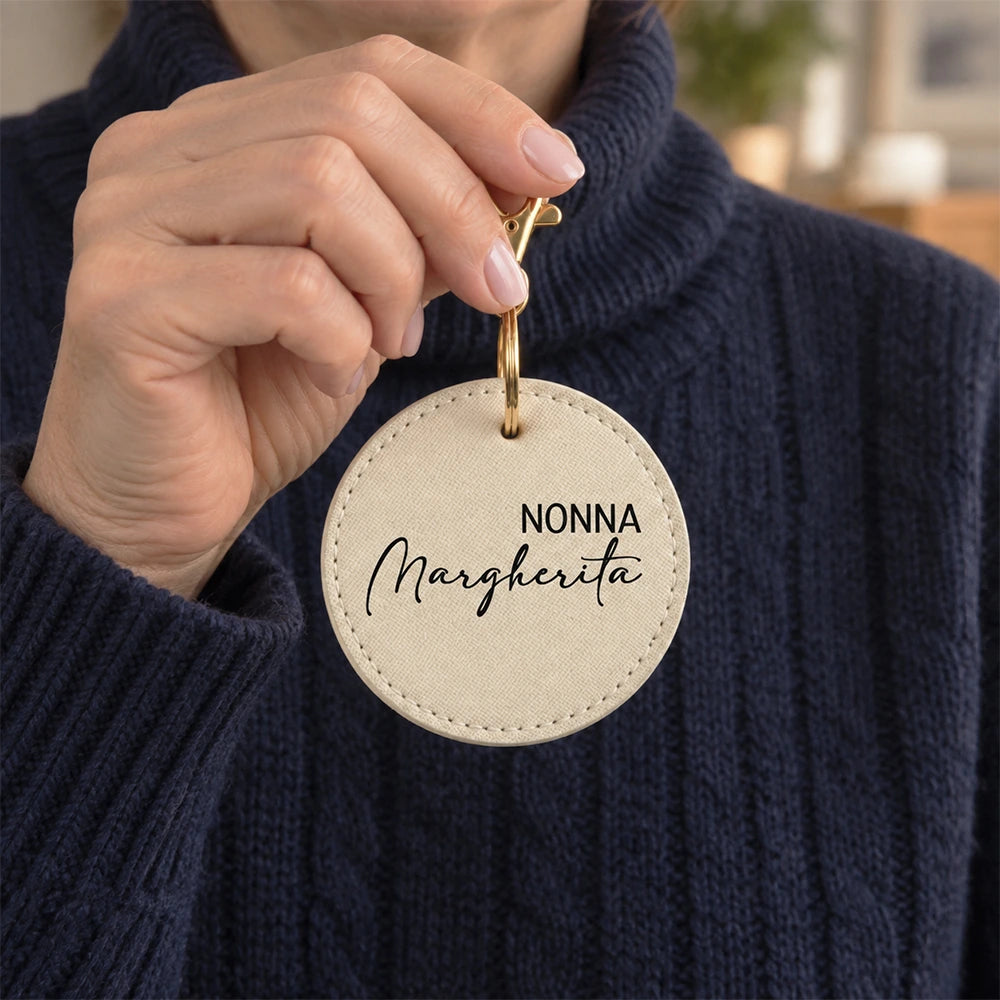 Portachiavi in pelle saffiano beige con gancio dorato