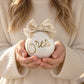 Sfera di Natale bianca personalizzata con nome e fiocco